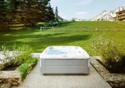 Jacuzzi® J385IP™ - 7 Person Hot Tub 28 Jacuzzi® J385IP™ - 7 Person Hot Tub -Outdoor Living Store JHT J385 Lifestyle BrushedGray V3 2000x1414 cd4d6490 eb8a 4cc8 93ff 7e2768be9789